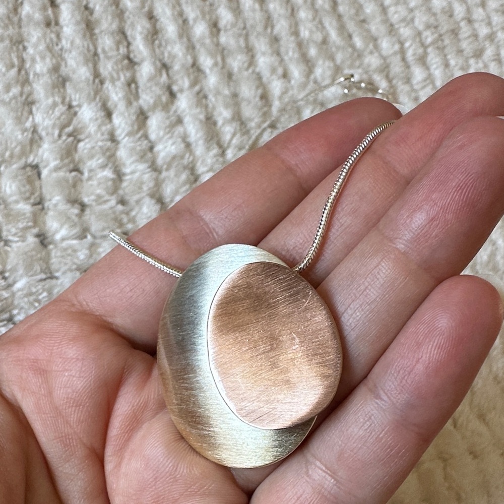 Elegant Silver and Gold Pendant Necklace